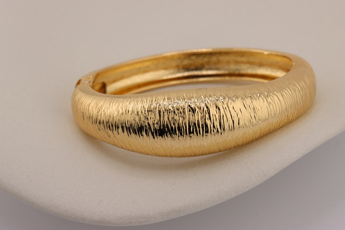 "Textured Gold Elegance Bracelet"